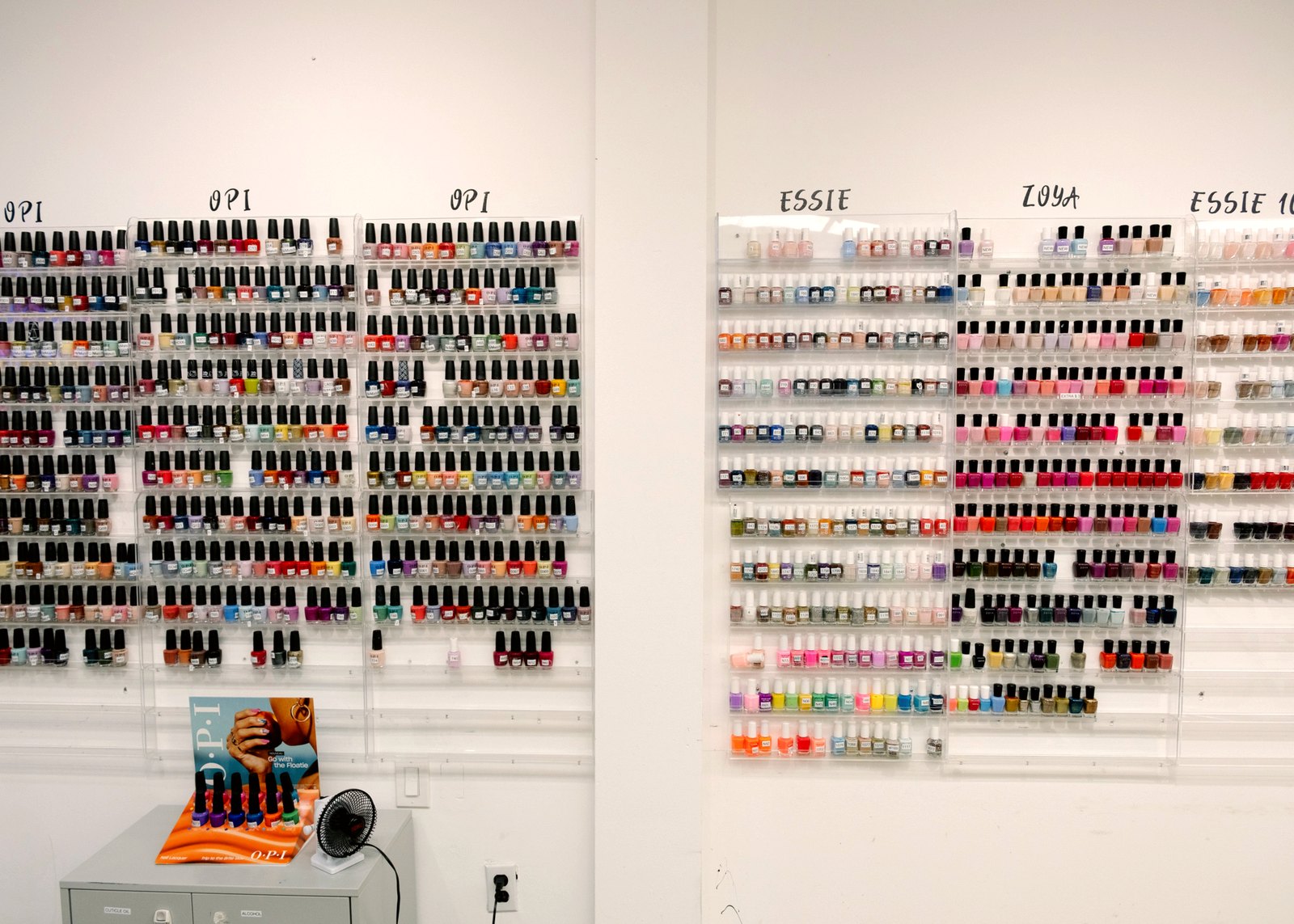 Wall of OPI, Essie and Zoya nail polish colors at Julie's Nails
