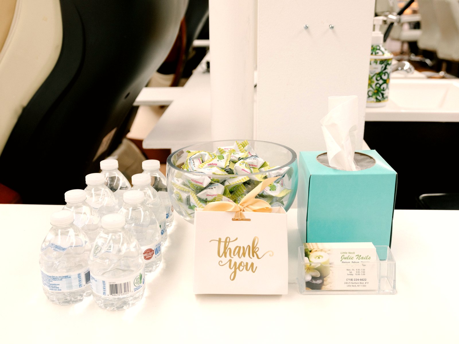 Front desk with water, candy and business cards